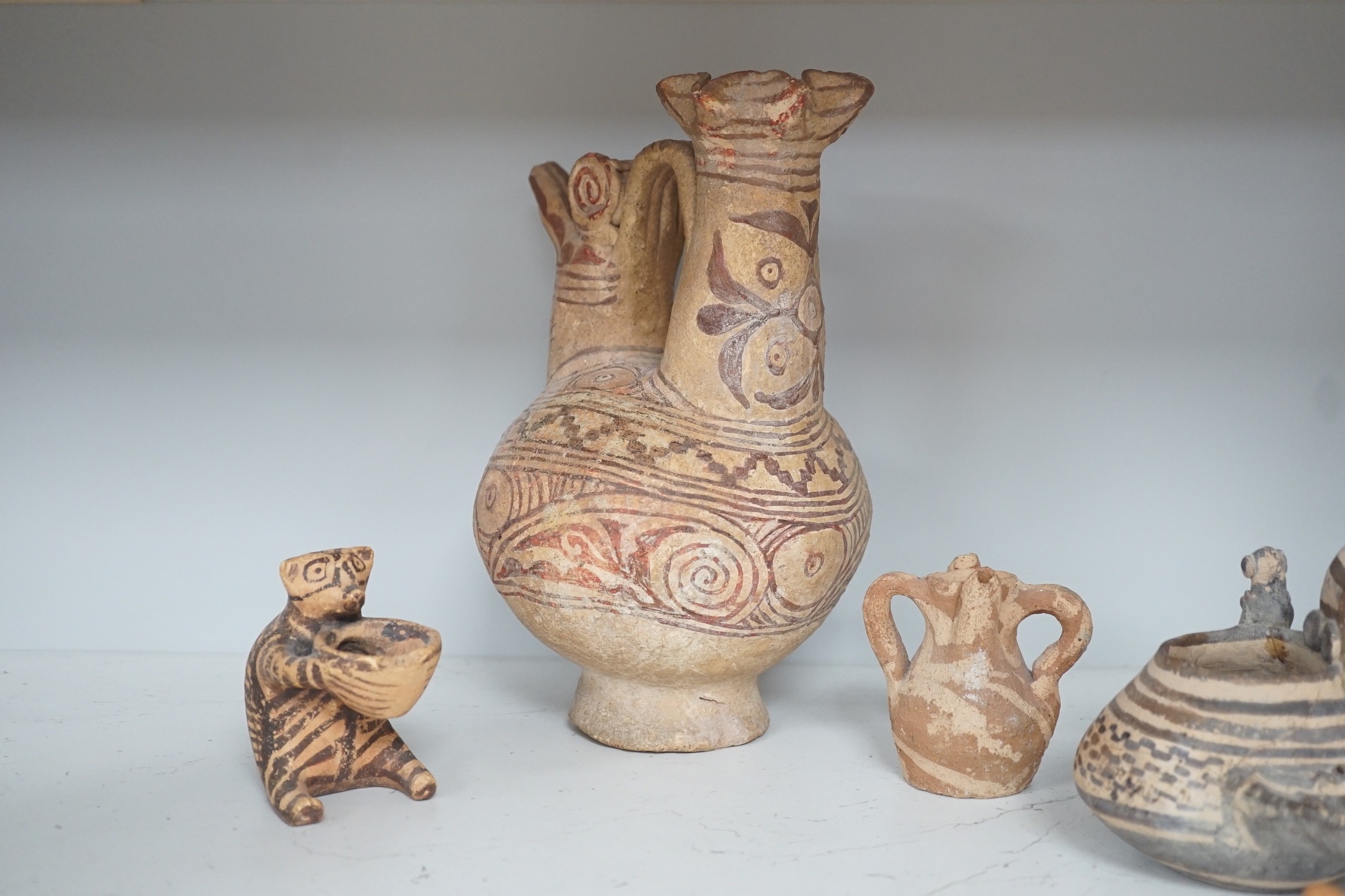 A selection of early Pre-Colombian, and other ceramics, to include an unusual vessel. Tallest 26cm
